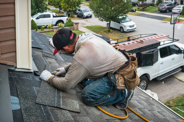 Professional Roofing technician working in Yachats, OR
